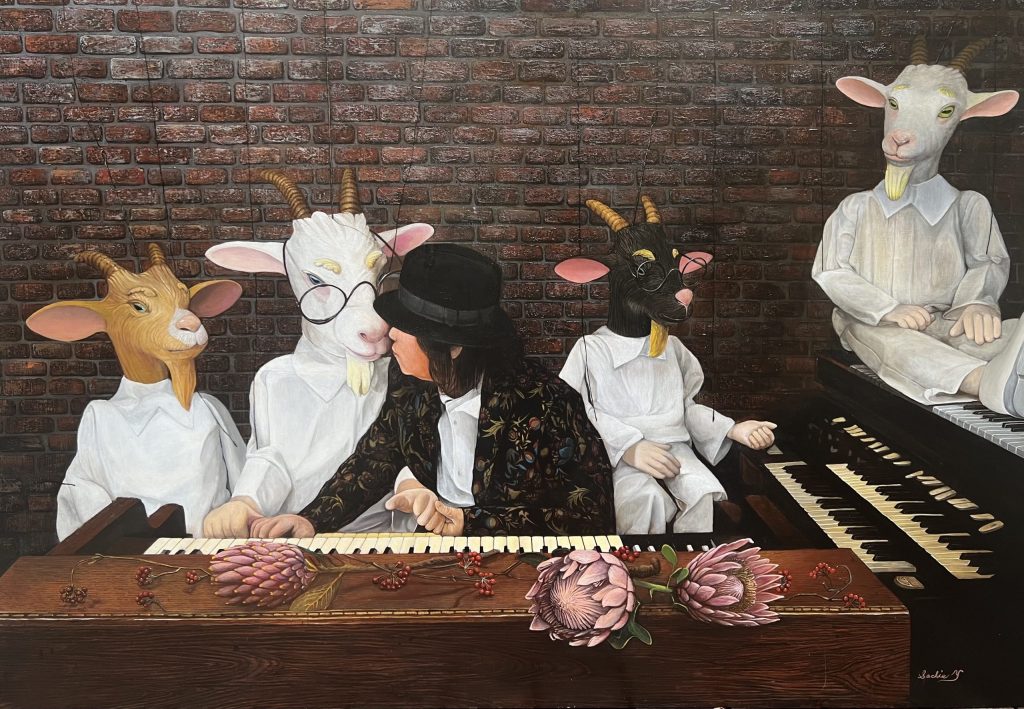 Why goats? Japanese goats are known to eat paper and trash and Sachie would like all goats to eat paper and trash in the world to make it a clean,beautiful and peaceful place to live.