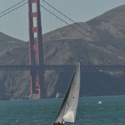 Sailboat approaching the Golden Gate Bridge in San Francisco, California
